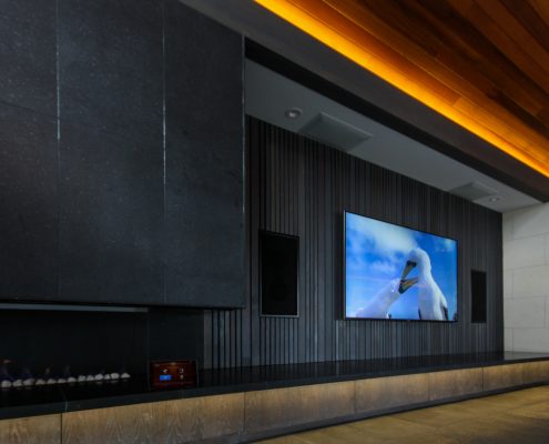 Home theater in living room with ceiling speakers
