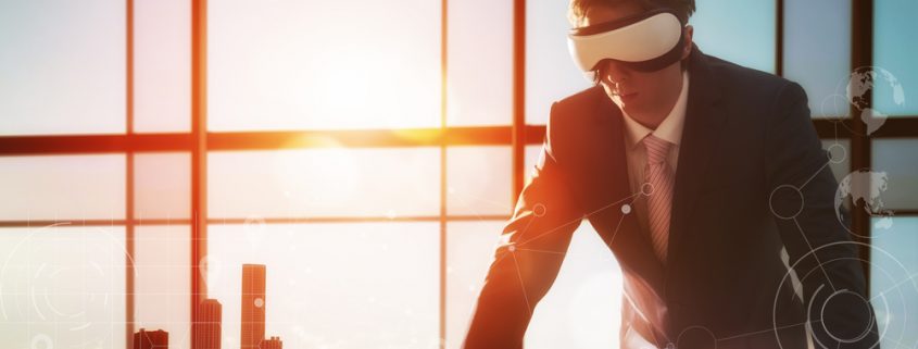 Businessman using virtual reality for project design