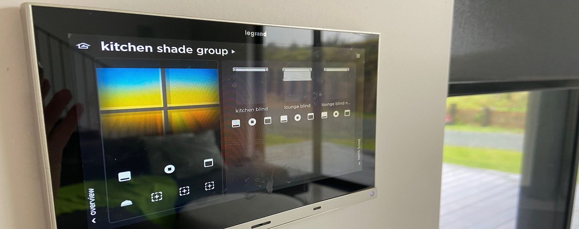 Vantage Equinox home automation LED touchscreen showing motorised blind control.