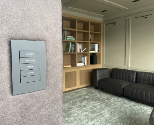 Crestron keypad in modern lounge